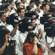Brazilian sailors filming John Paul II with video cameras during the weekly general audience in the Paul VI audience hall at the Vatican, in Vatican City, on July 6, 1988.